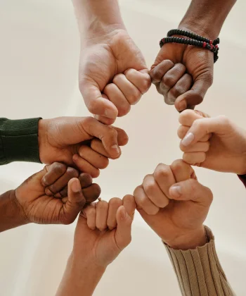 Hands joined in a circle &mdash; recovery at Dunamis is built with the family, not alone
