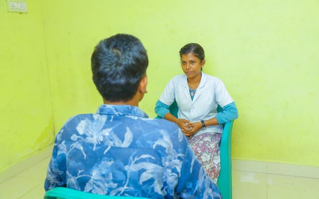 A counsellor meeting a new resident during the admission assessment at Dunamis, Madurai